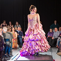 Female fashion model in pink dress