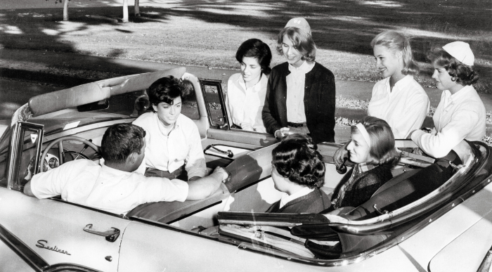 Lasell students from the Classes of 1963 and 1964 gather on Maple Street for Beanies Day in 1964. Photo courtesy of the Lasell University Winslow Archives.