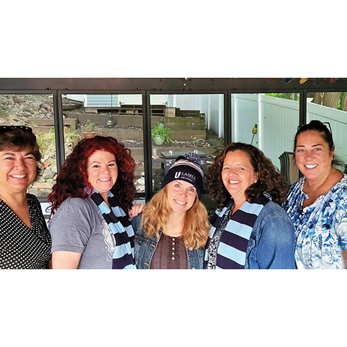 Pictured left to right: Michelle Forget White ’89, Tracey, Brandi Robinson '93, Cindy Dirienzo Lorenz '93, and Kristin Melone Lakacha ’92. 