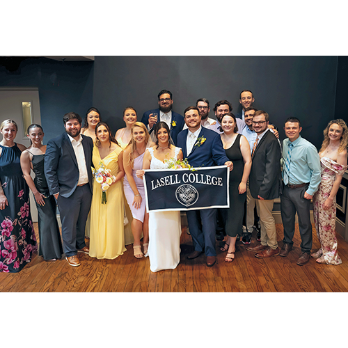 Mariana McCarthy '19 G'20 and Dylan Mitchell '19 at their wedding with Lasell community members