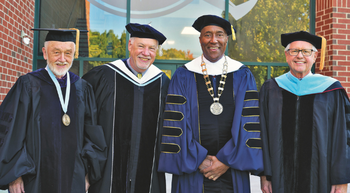 Lasell Presidents Tom de Witt, Michael B. Alexander, Eric M. Turner, and Peter Mitchell at Turner's inauguration in fall 2024