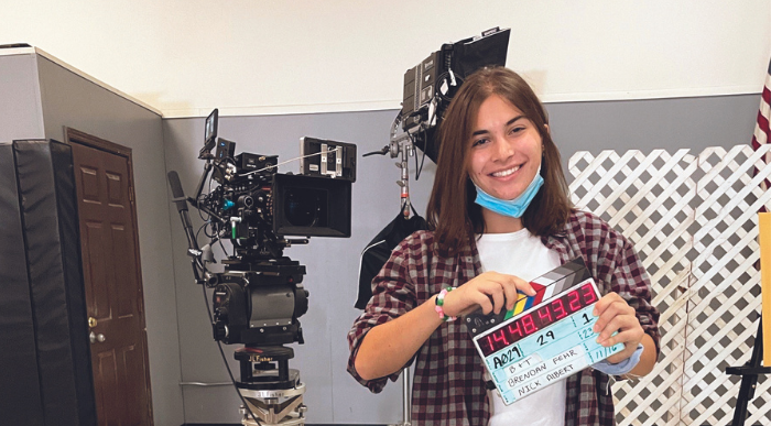 Lasell student on a film set as part of an internship