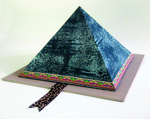Book cover modeled after the Great Pyramid designed by Professor Emerita Margo Lemeiux