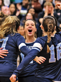 Lasell women's volleyball team at the GNAC finals