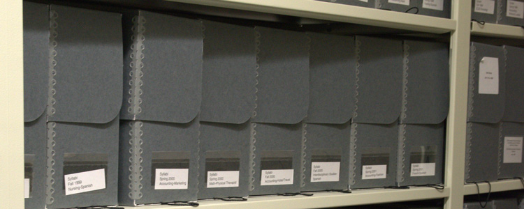Archival boxes on shelves