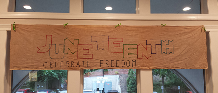 Juneteenth banner at Lasell Village saying "Celebrate Freedom"