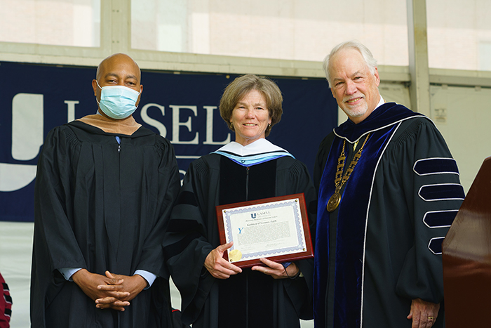 Kathleen O'Connor, Keon Holmes, and Michael B. Alexander at Lasell 2021 Commencement