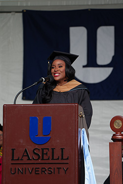 Anastacia Balfour-Demarco delivers the graduate address at Lasell University Commencement