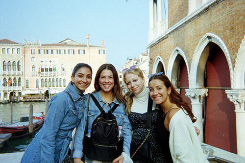four students by water in florence
