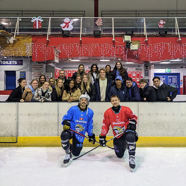 Players and Lasell students at Belfast hockey game